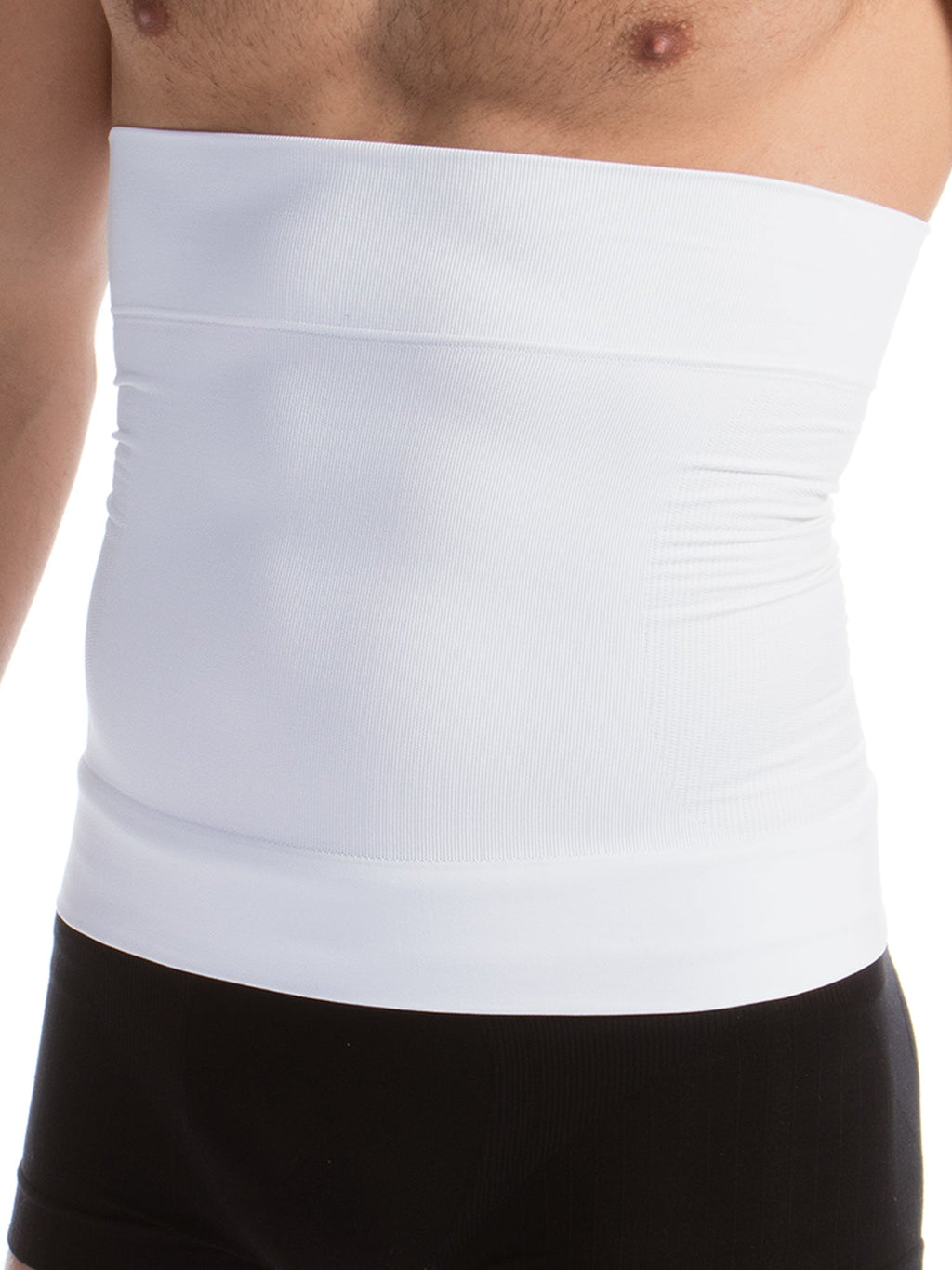 White strapless top worn by a person with black pants.