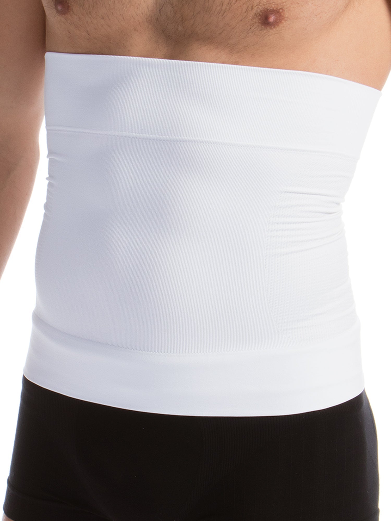White strapless top worn by a person with black pants.