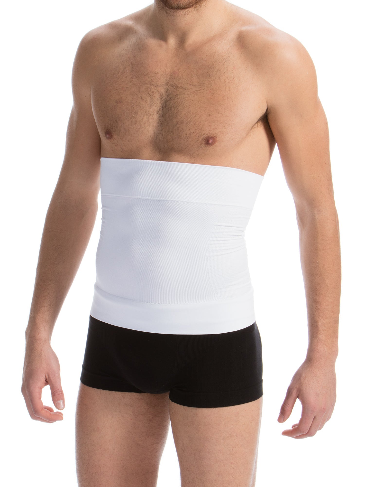 Man wearing a white compression wrap on his torso against a white background