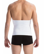 Person wearing a white compression garment on the back with a plain background