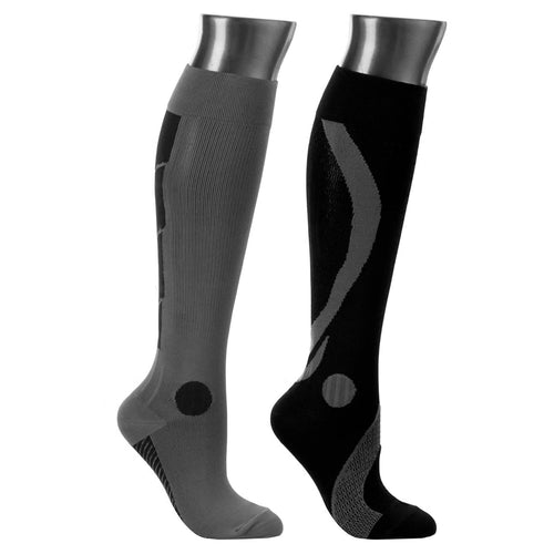 Black and gray knee-high socks on a white background