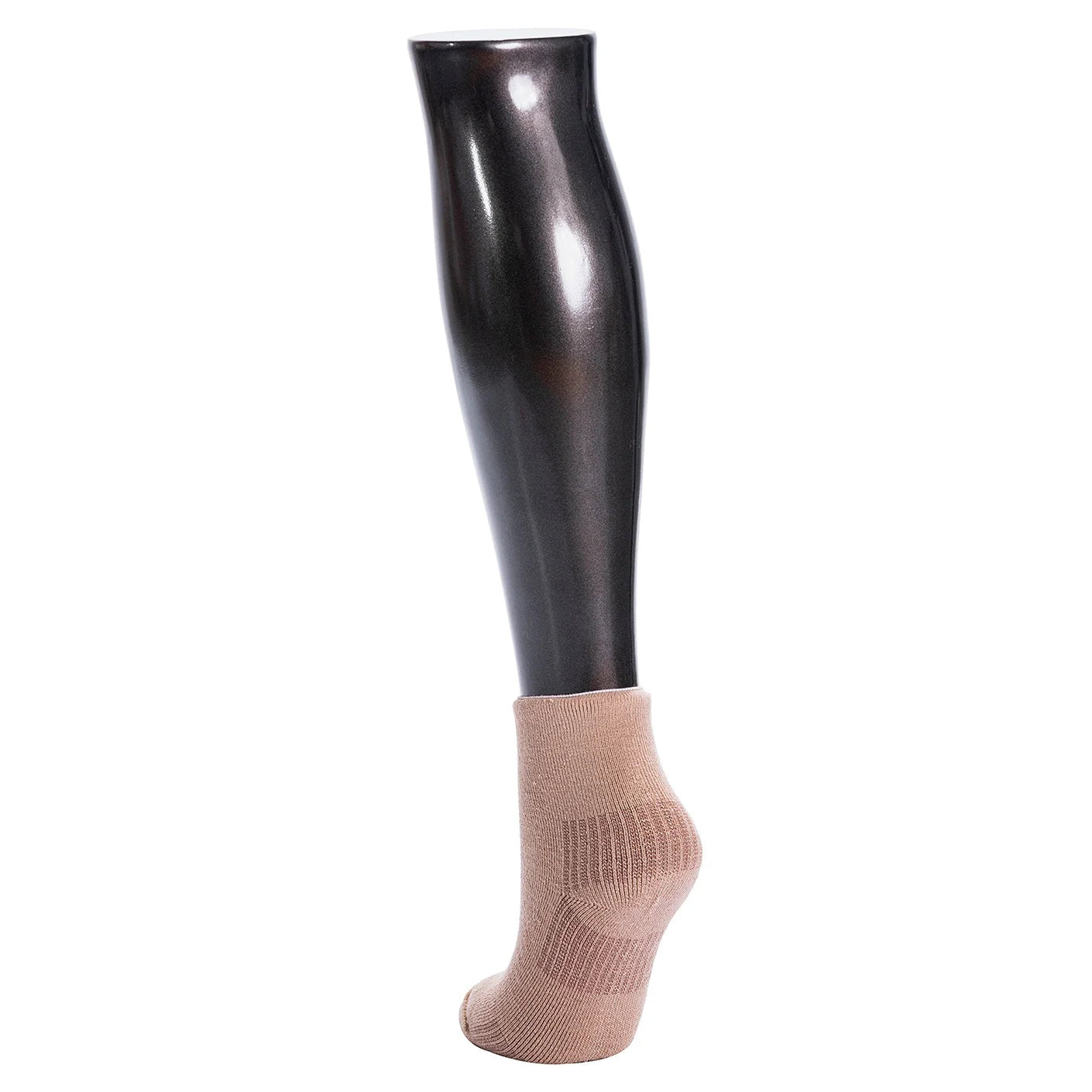 Black legging over a beige sock on a white background