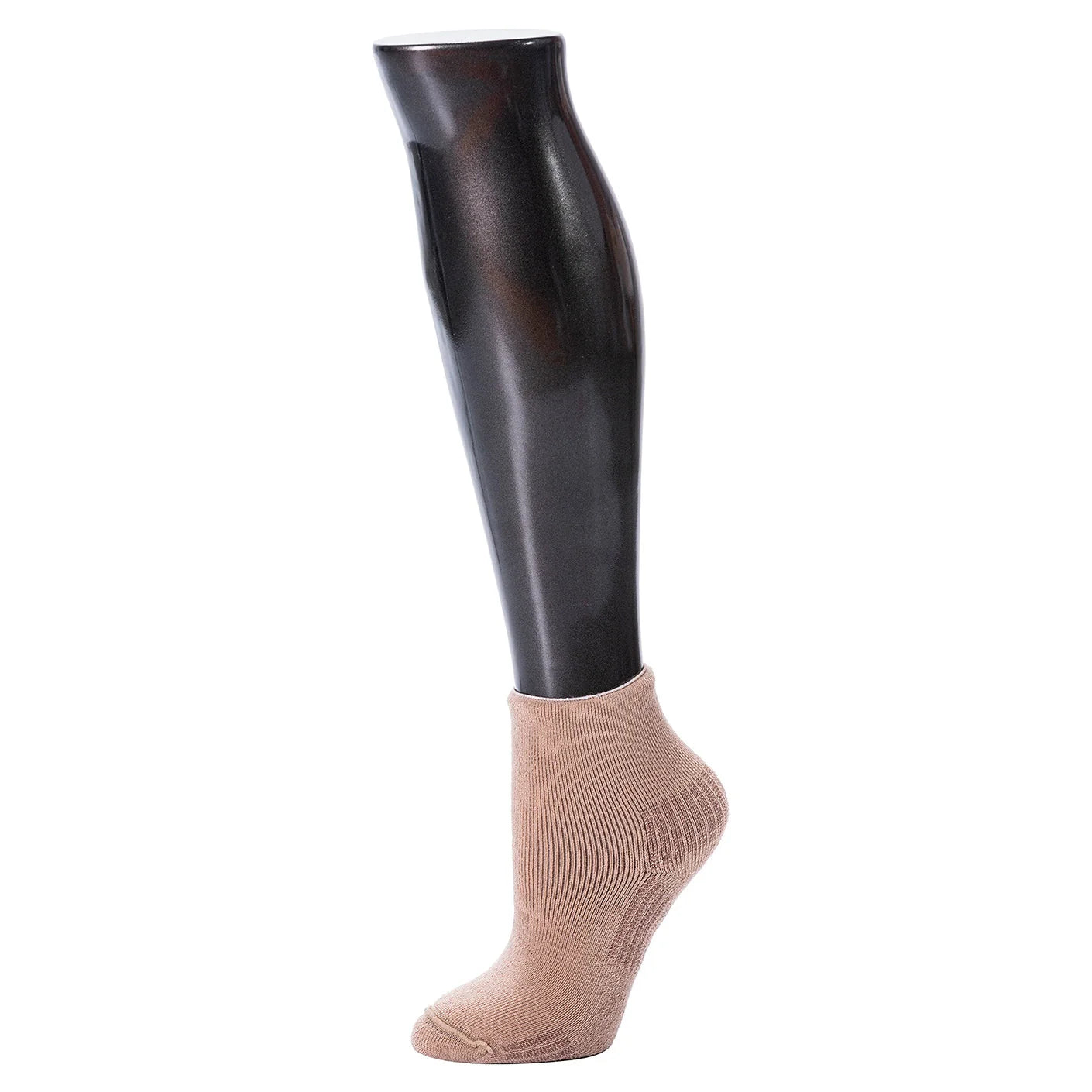 Black vinyl leg cover over a beige sock on a white background