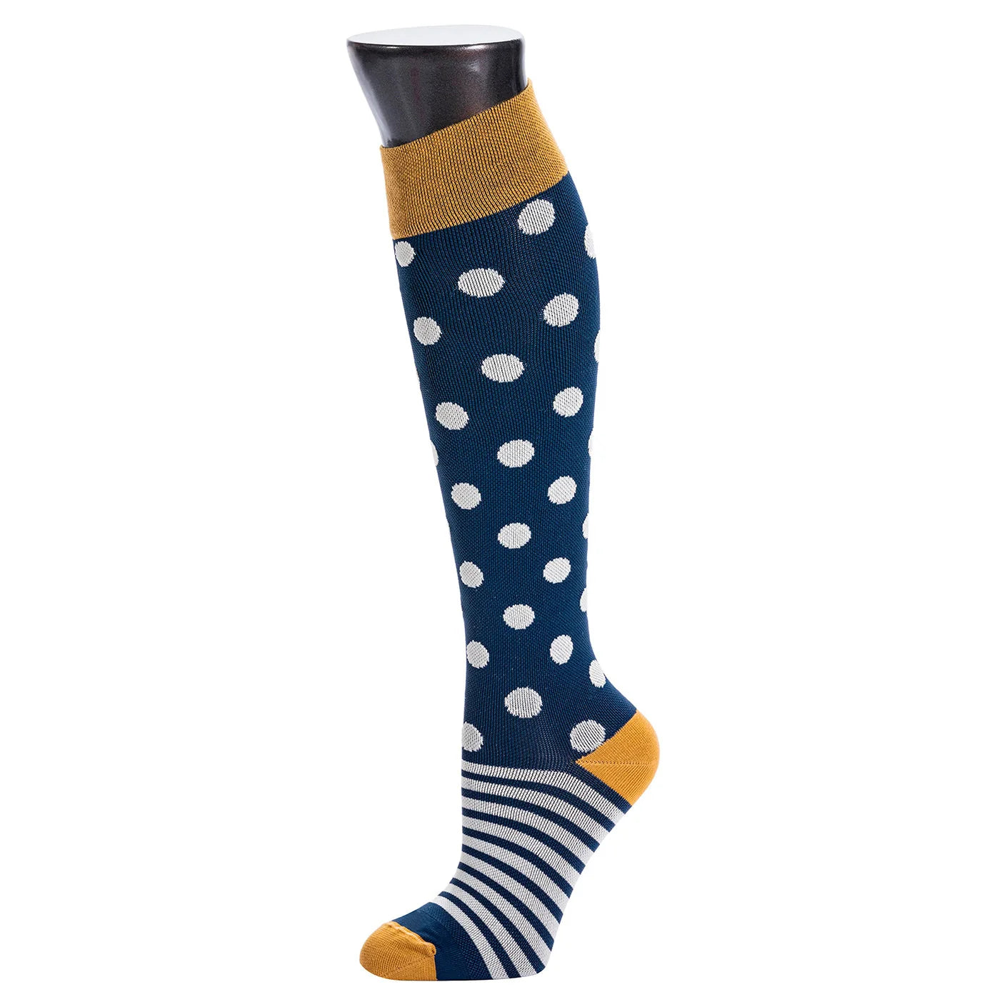Navy knee-high sock with white polka dots and yellow accents on a white background