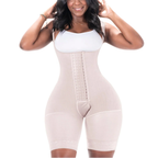 Woman wearing a beige body shaper against a white background