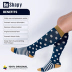 Compression socks with polka dot pattern on a white background, featuring the brand 'Be Shapy'.