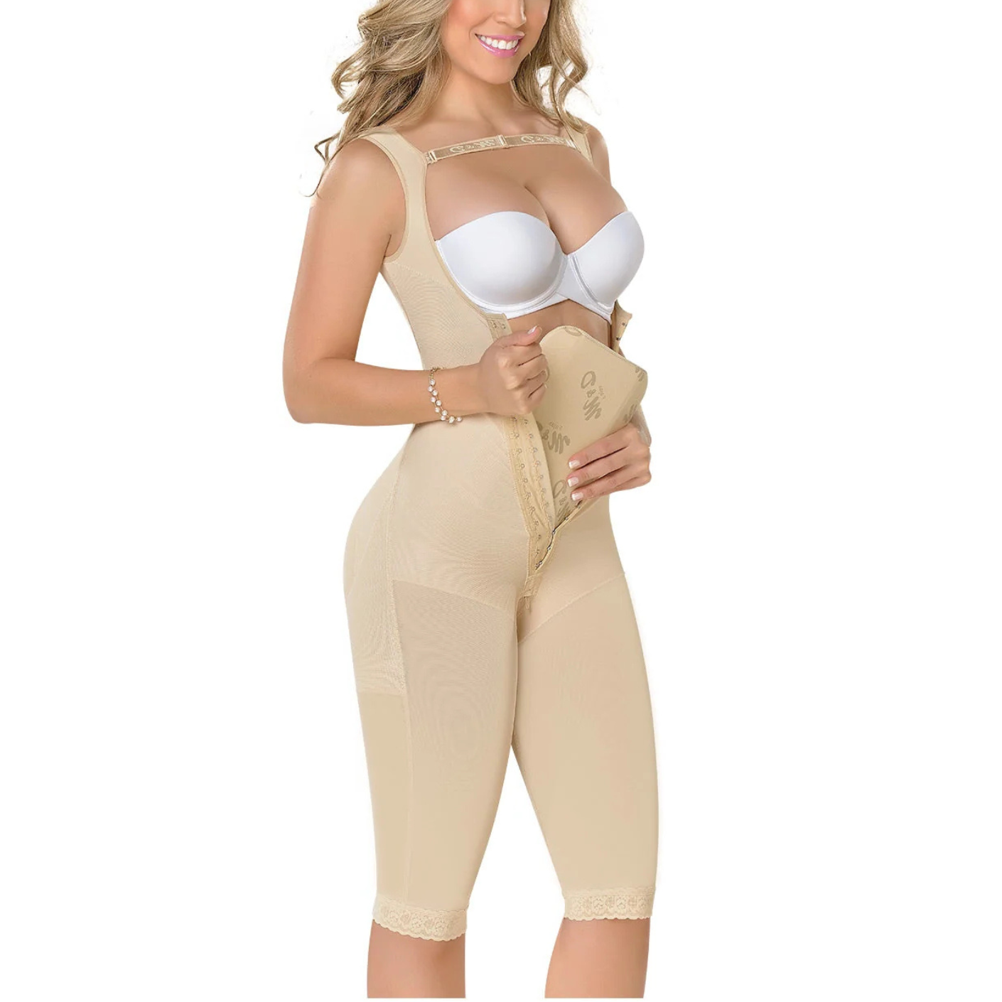 Woman wearing a beige shapewear garment on a white background