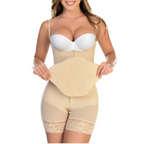 Woman wearing a beige shapewear garment on a white background