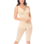 Woman wearing a beige shapewear jumpsuit on a white background