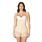 Woman wearing a beige shapewear body suit over a white bra on a white background
