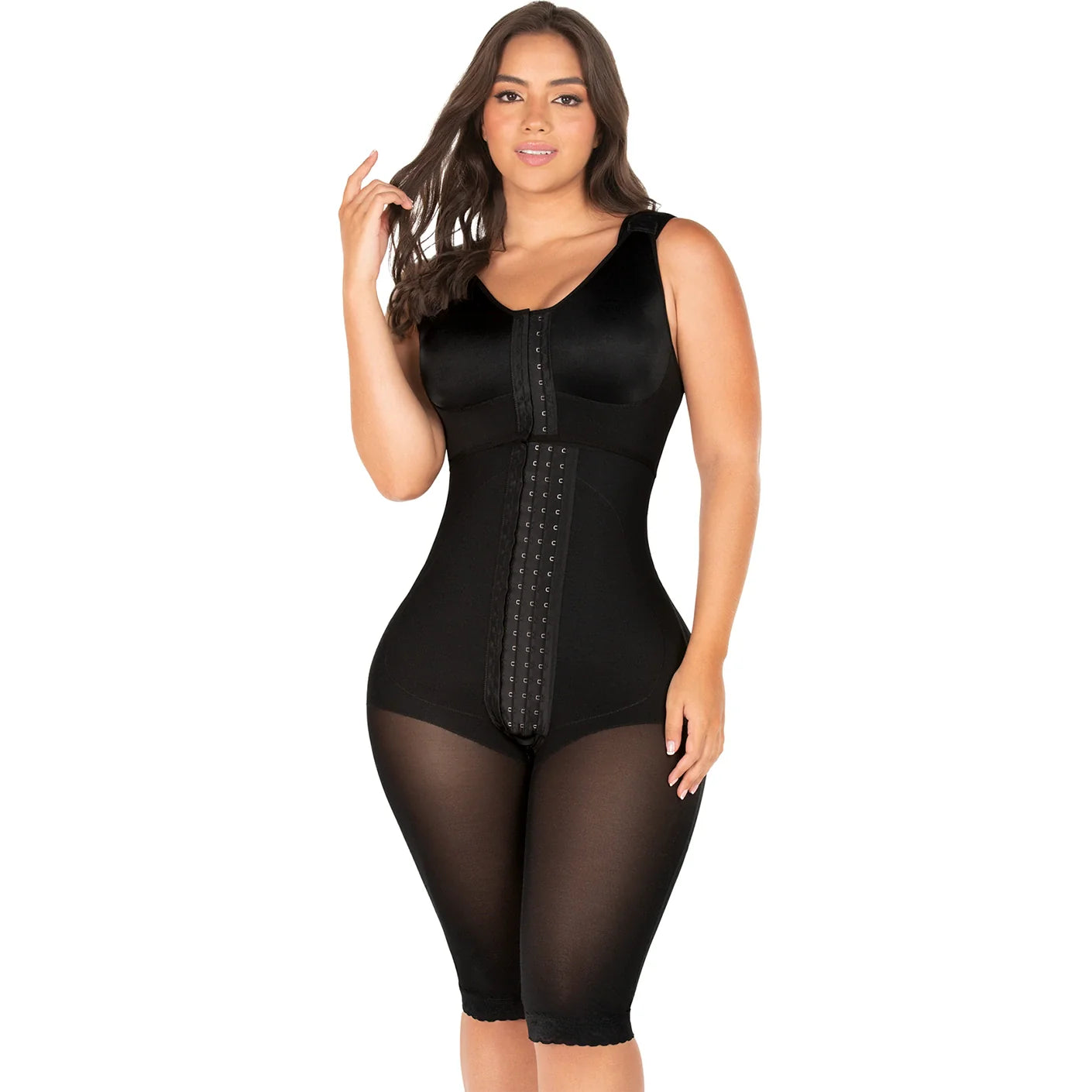 Woman wearing a black shapewear bodysuit on a white background