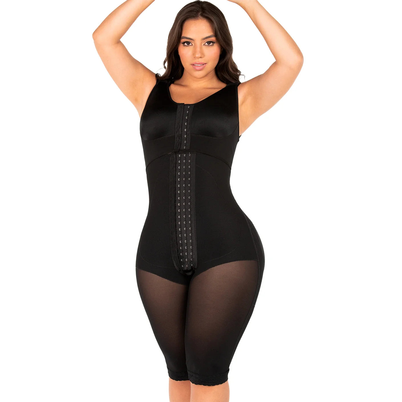Woman wearing a black body shaper on a white background