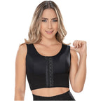 Woman wearing a black long bra on a white background