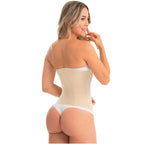 Woman wearing a beige shapewear bodysuit on a white background