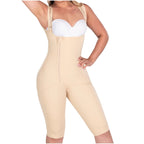Beige overalls worn with a white strapless top on a white background
