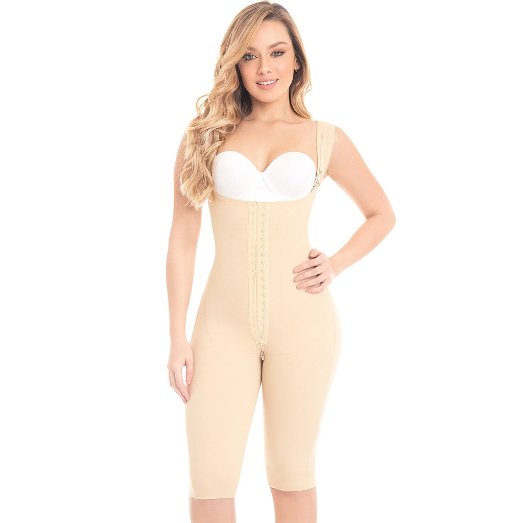 Woman wearing a beige body shaper over a white background