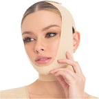 Woman wearing a beige post surgical face mask on a white background