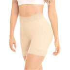 Beige shapewear shorts worn by a person on a white background