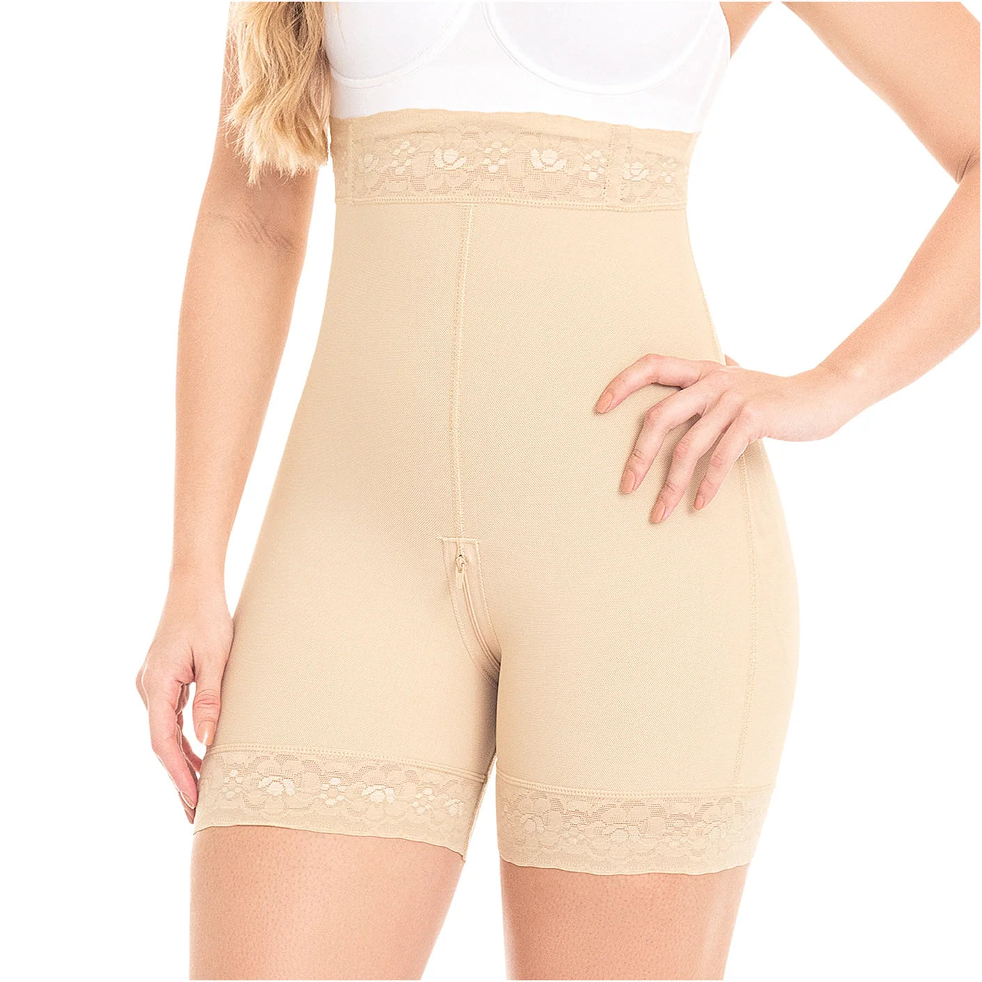 Beige shapewear shorts with lace details worn by a person on a white background