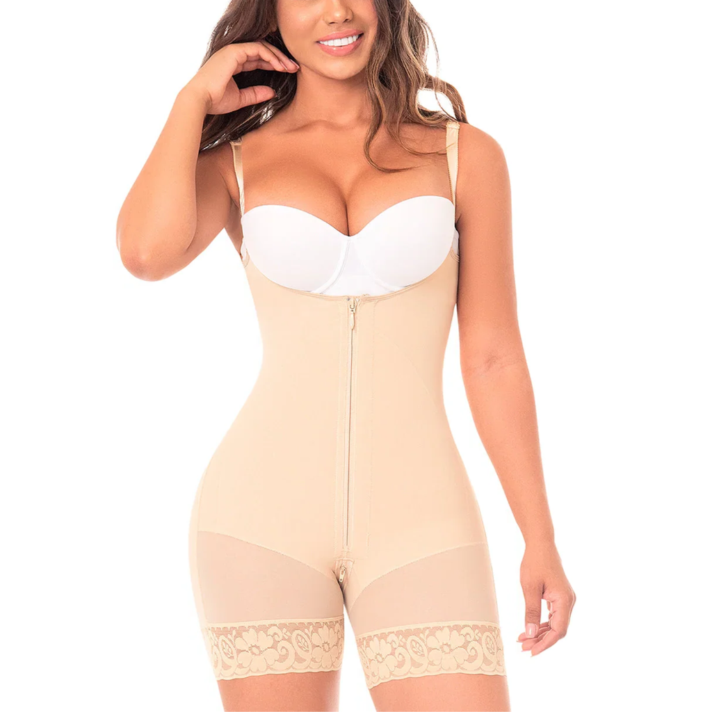 Woman wearing a beige shapewear garment on a white background