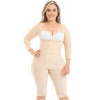Woman wearing a beige body shaper on a white background