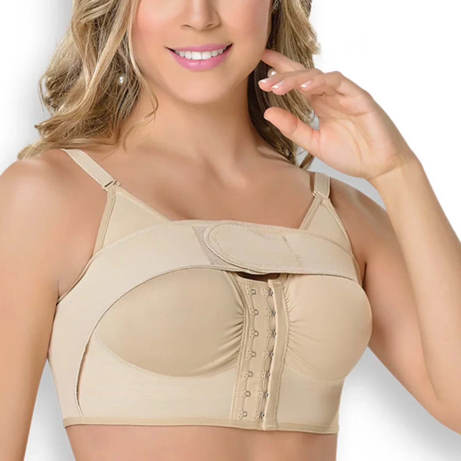 Woman wearing a beige compression garment on a white background