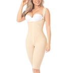 Woman wearing a beige body shaper on a white background