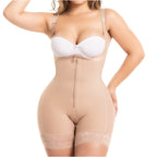 Beige full-body shapewear with front zipper, lace trim, and open crotch, worn with white bra, front view