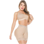 Beige high-waist shapewear shorts with lace trim and open crotch, worn with matching bra, front view