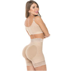 Side view of beige high-waist shapewear shorts highlighting butt lifting and smooth silhouette