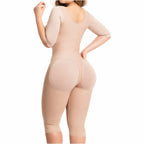 Back view of beige shaper with three-quarter sleeves and butt-lifting panels.