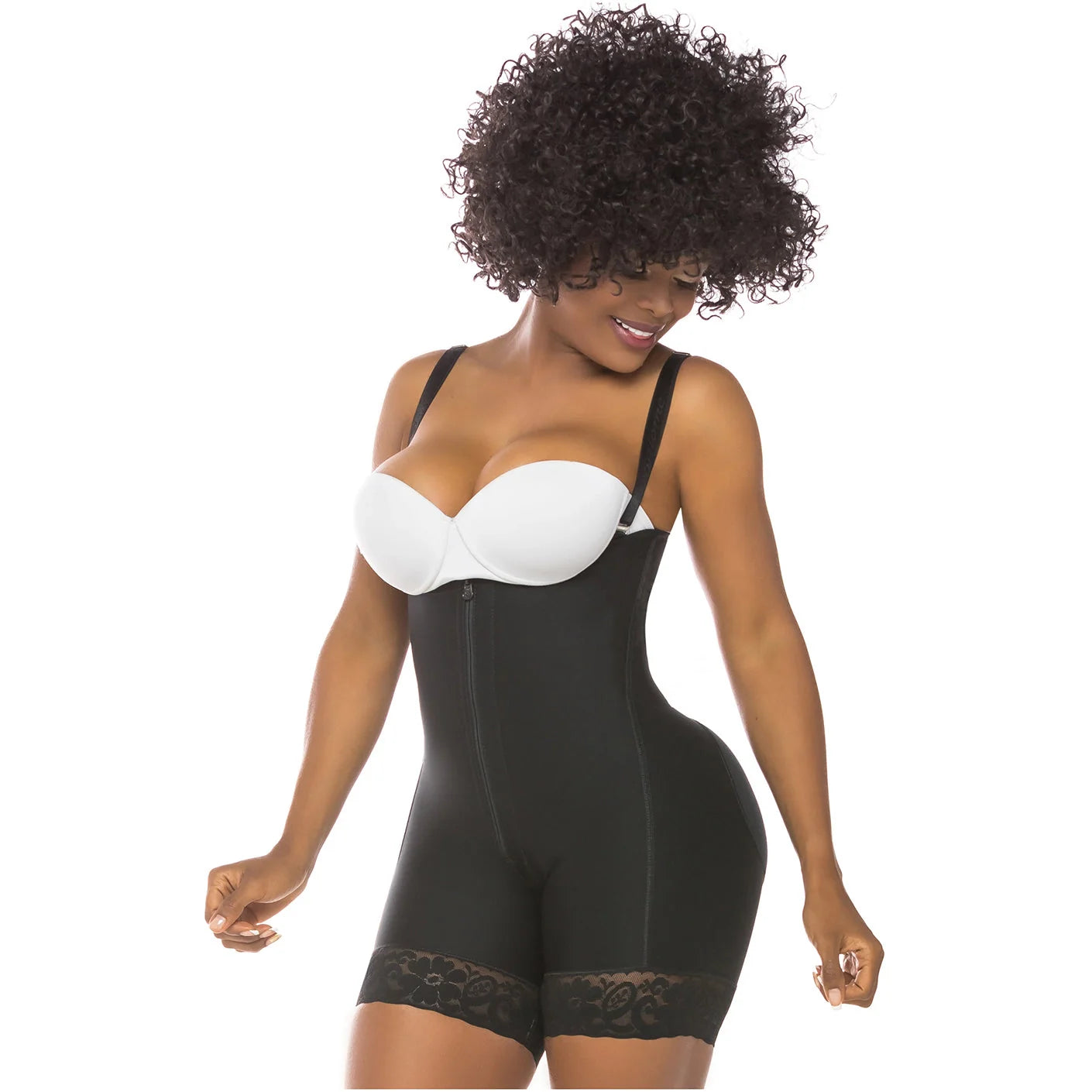 Black full-body shapewear with front zipper and lace trim, worn with white bra, front view