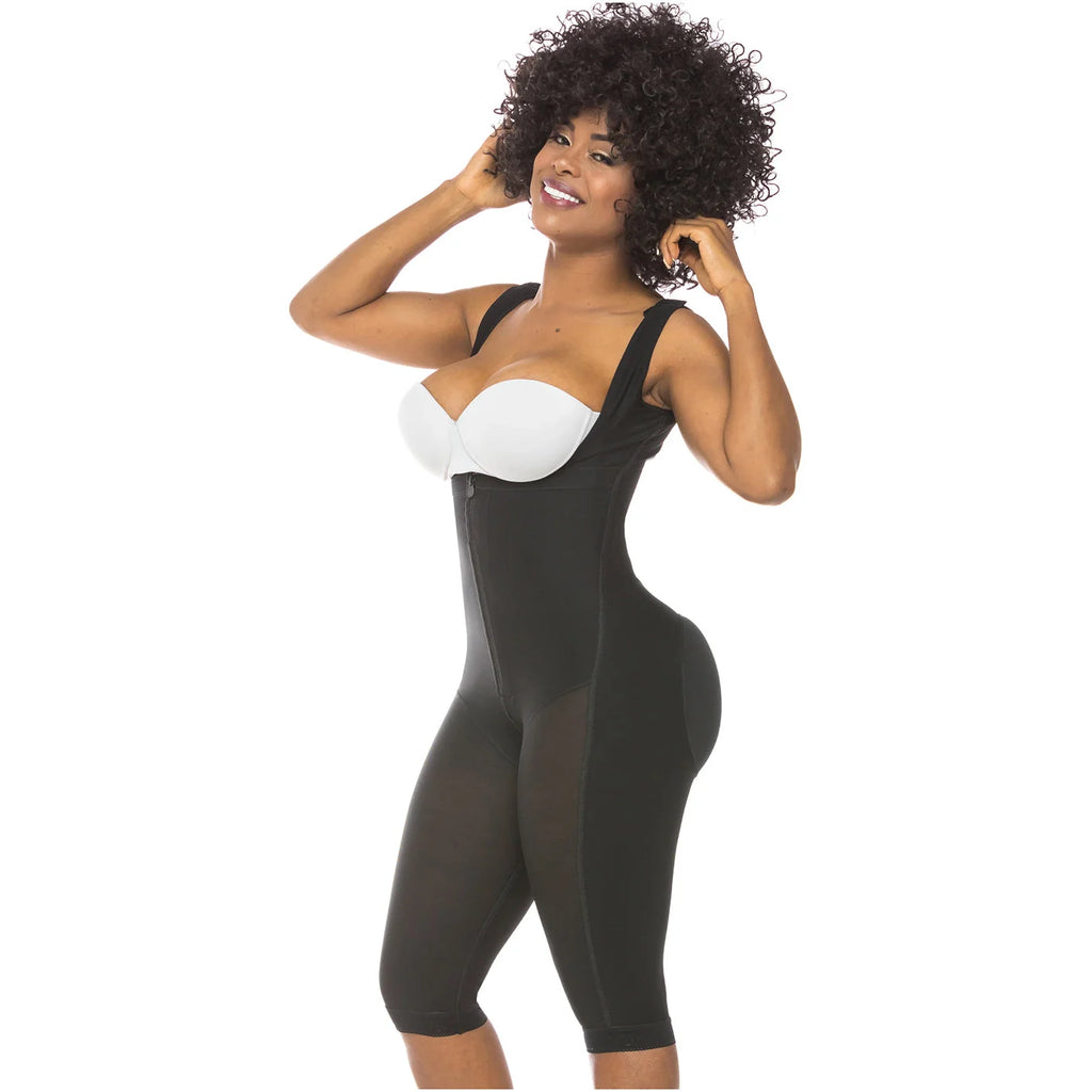 Black shaper with built-in white bra, front zipper, and mesh panels, worn by a model.