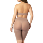 Beige shapewear garment worn by a model on a white background