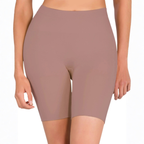 Brown biker shorts worn by a person on a white background