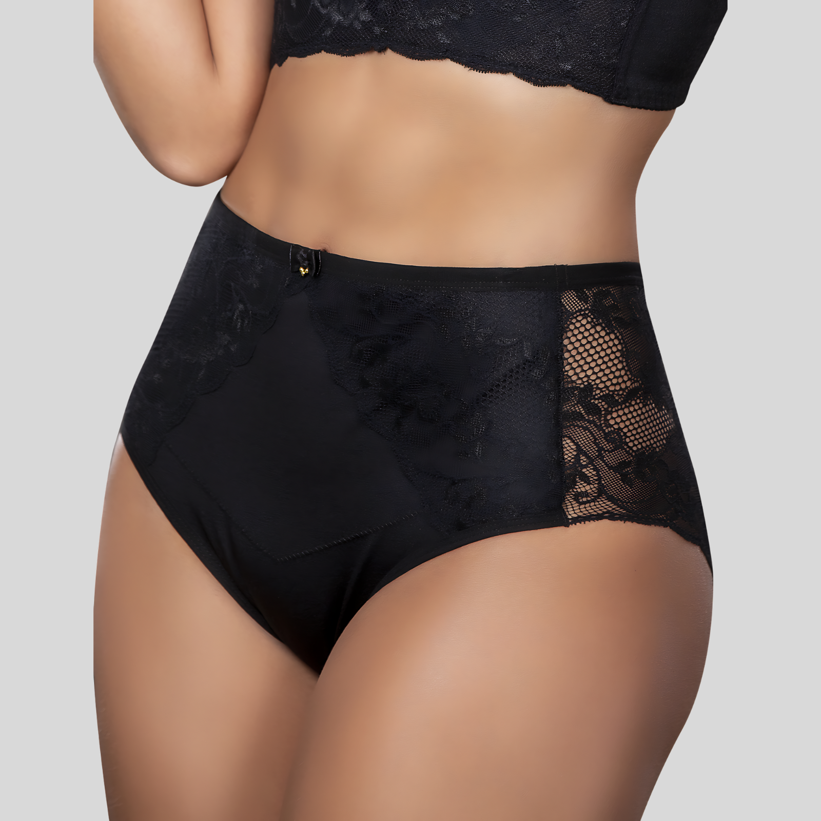 Black lace underwear on a plain background