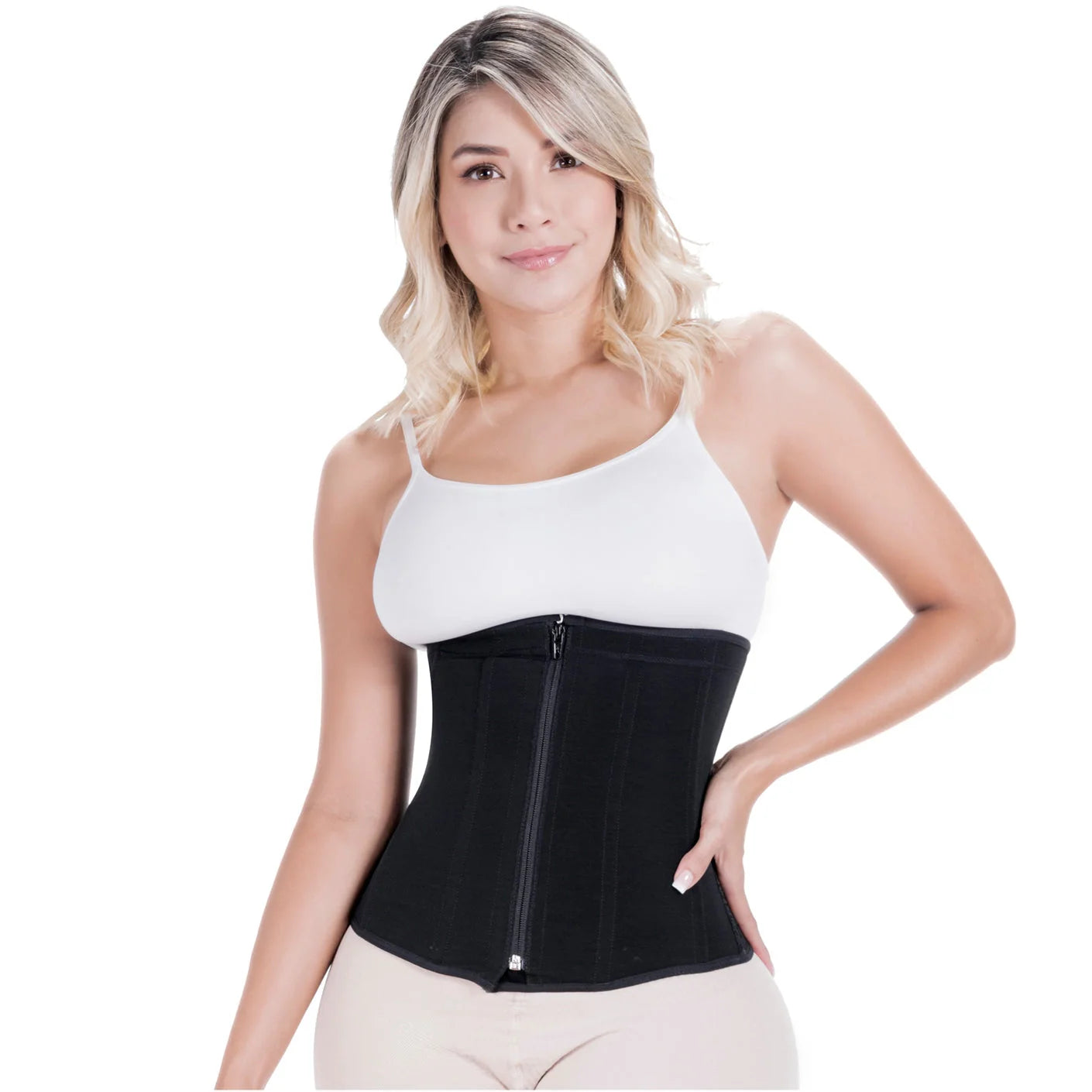 Woman wearing a black waist trainer over a white tank top on a white background