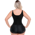 Black shapewear bodysuit worn by a model on a white background