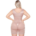 Woman wearing a beige body shaper on a white background