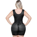 Black shapewear garment worn by a model on a white background