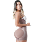 Woman wearing a beige body shaper against a white background