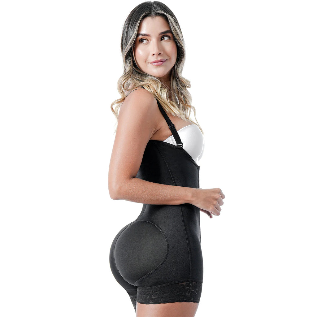 Woman wearing a black shapewear garment on a white background
