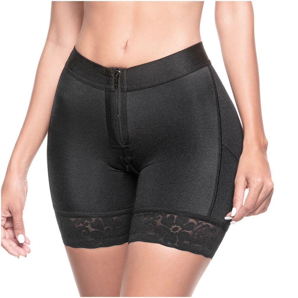Black shapewear shorts with lace trim on a white background