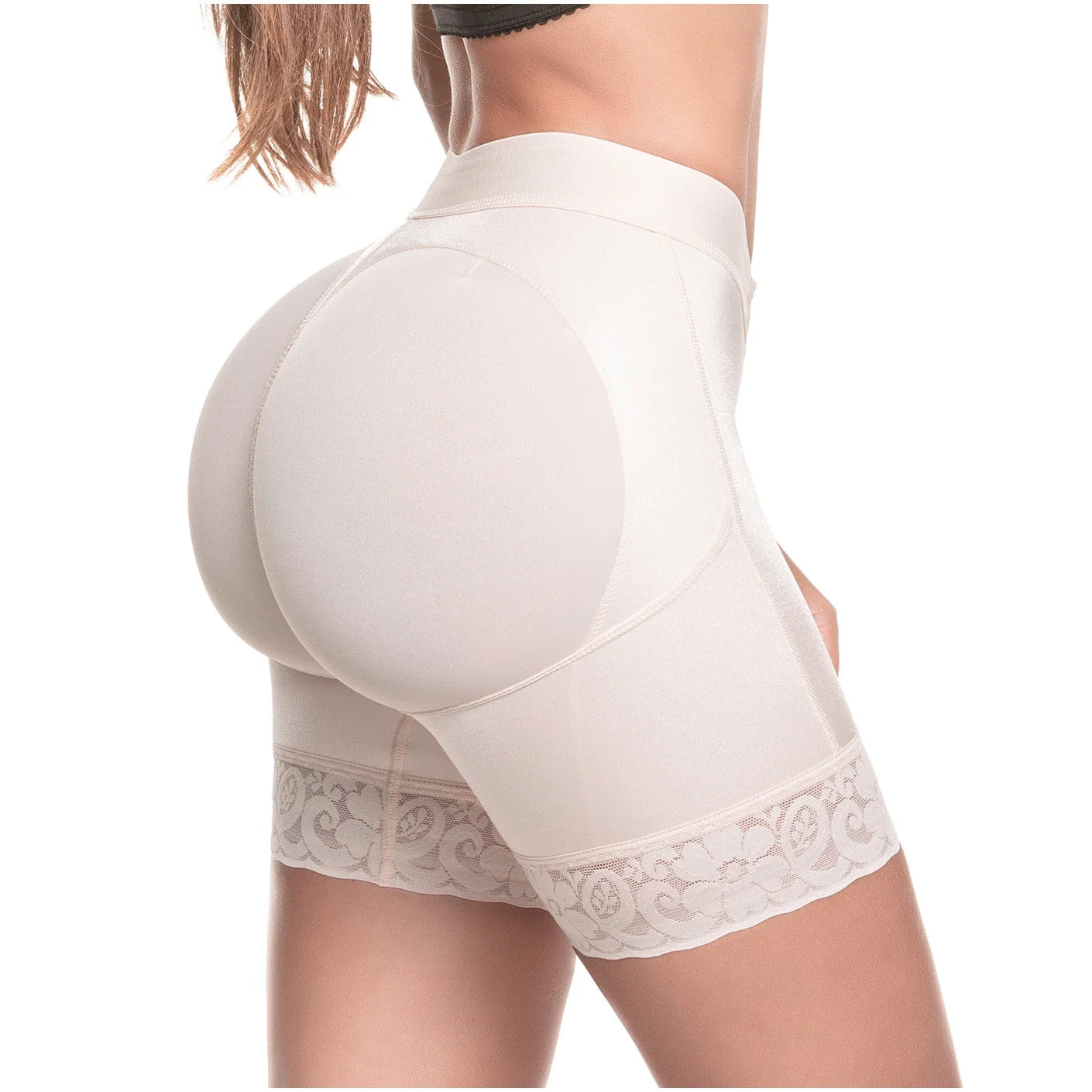 White shapewear shorts with lace trim on a white background