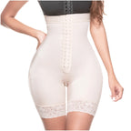 White shapewear garment worn by a person on a white background