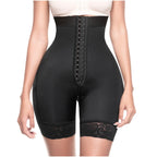Black shapewear shorts with lace details on a white background