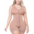 Woman wearing a beige shapewear bodysuit on a white background