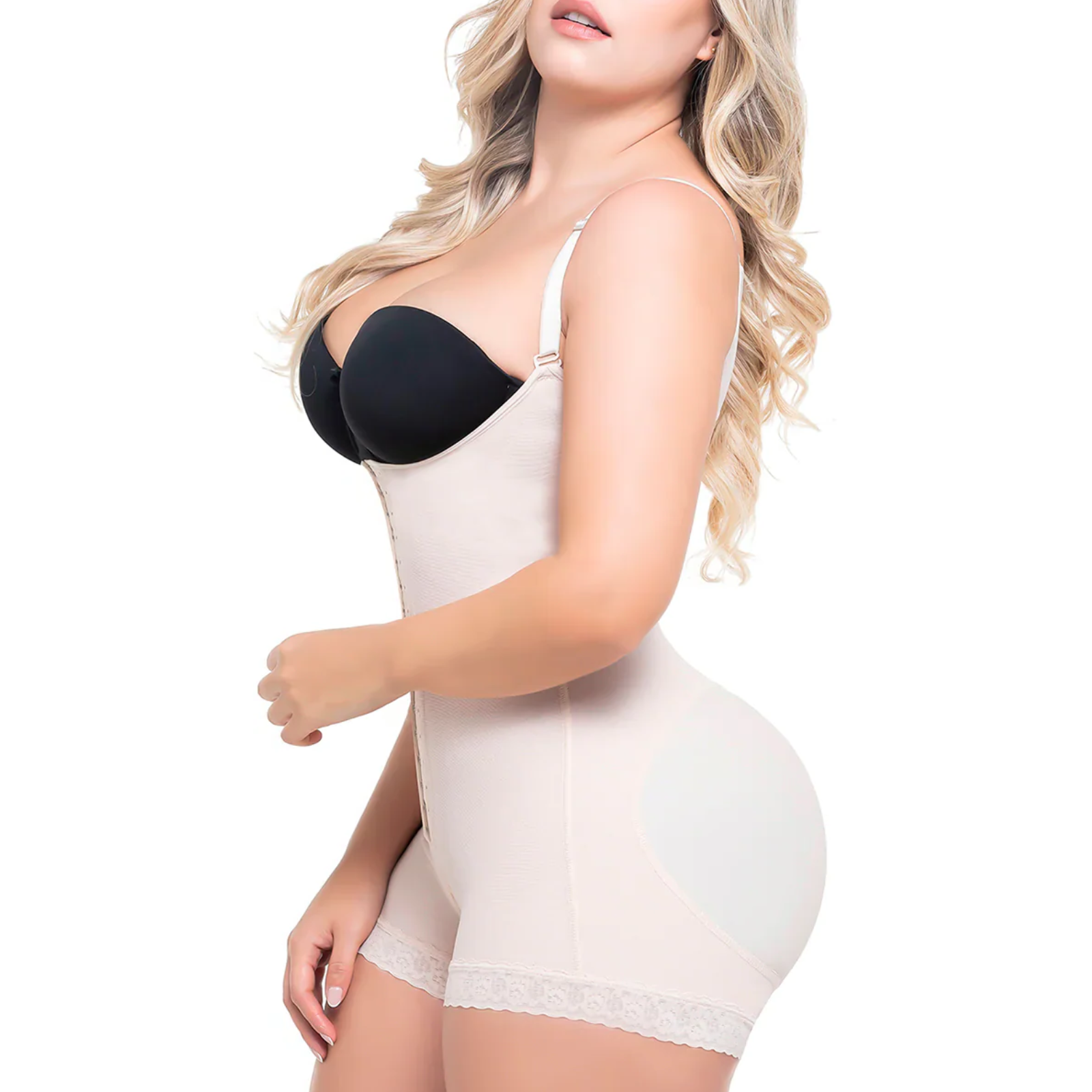 Woman wearing a beige shapewear garment on a white background