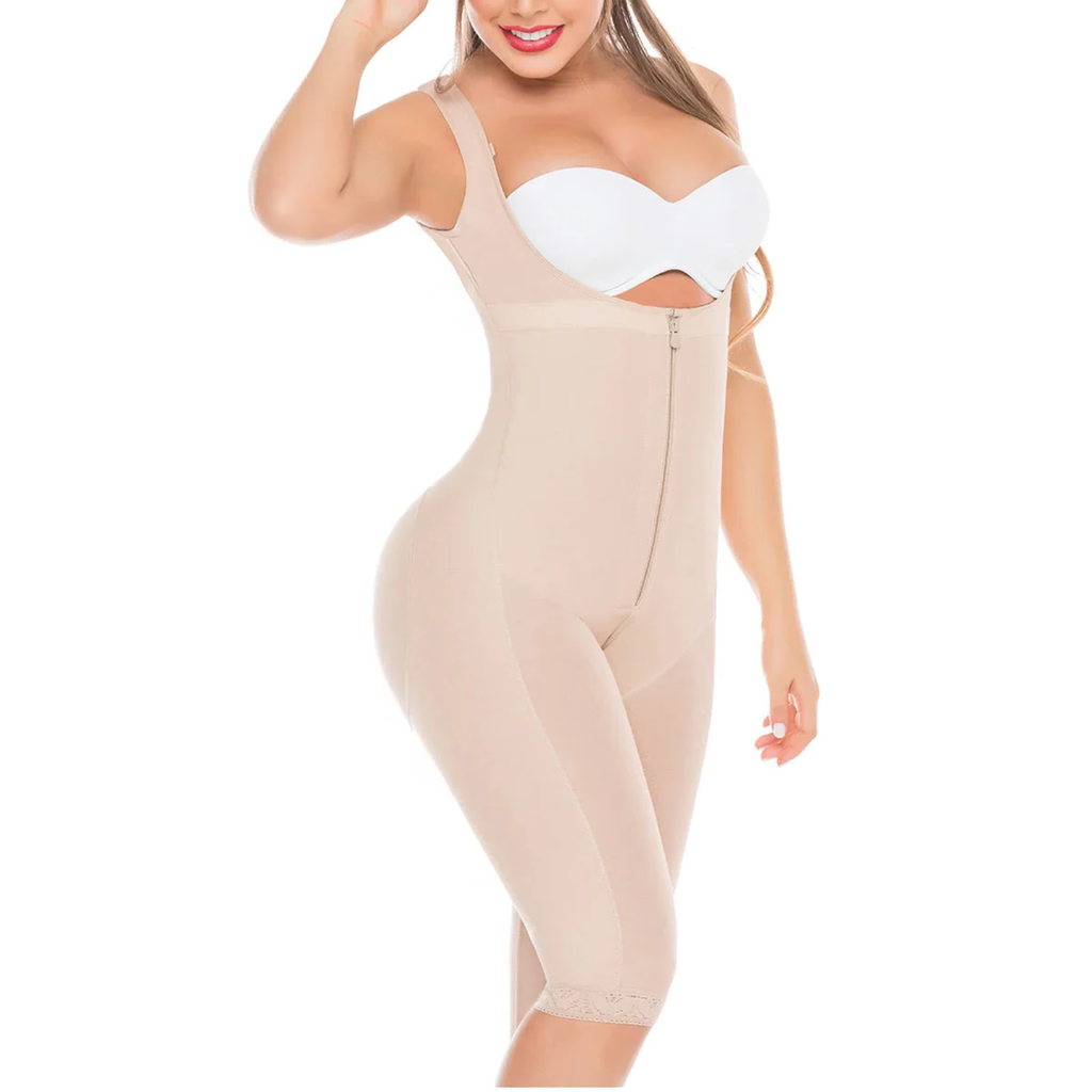 Woman wearing a beige shapewear garment on a white background