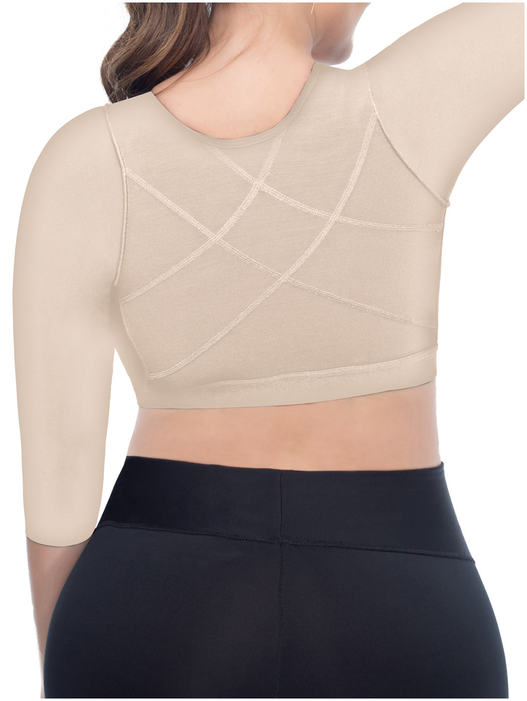 Beige crop top with criss-cross back design worn by a person, on a white background